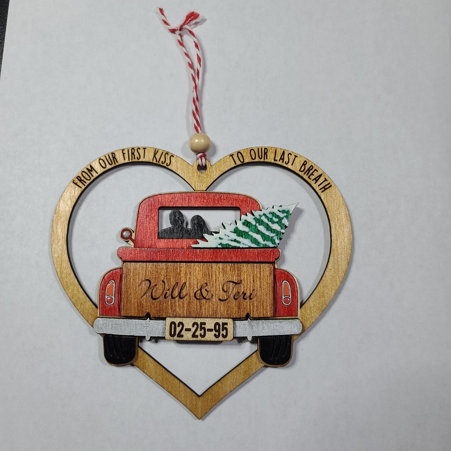 from our first kiss to our last breath anniversary ornament with red truck and tree in bed of truck