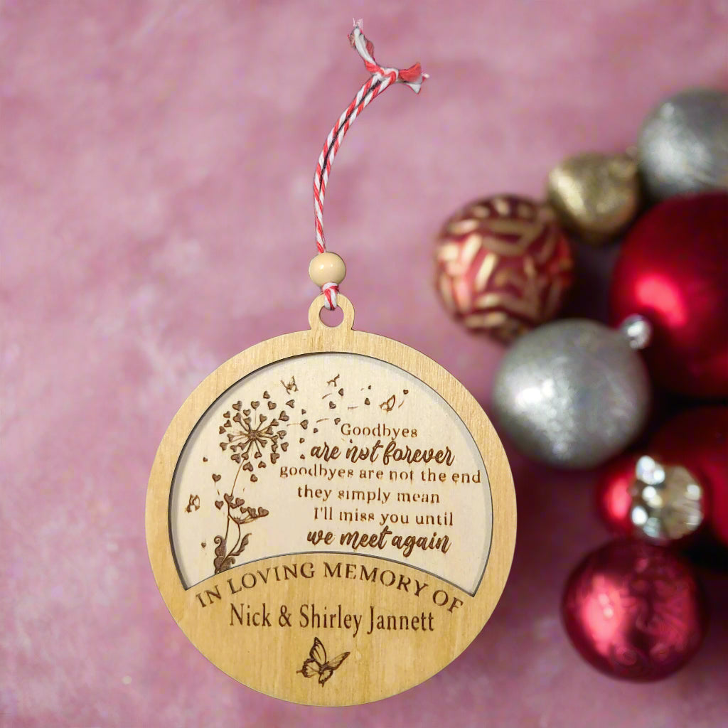 in loving memory of ornament with a dandelion with hearts as the seeds
