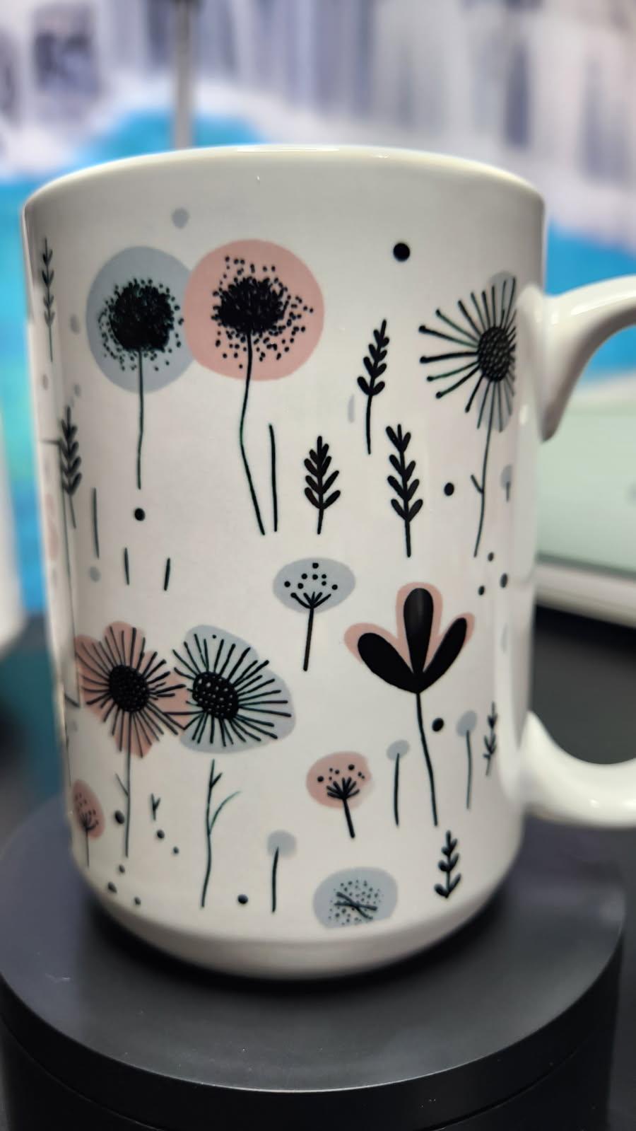 Mug with floral design on a dark surface