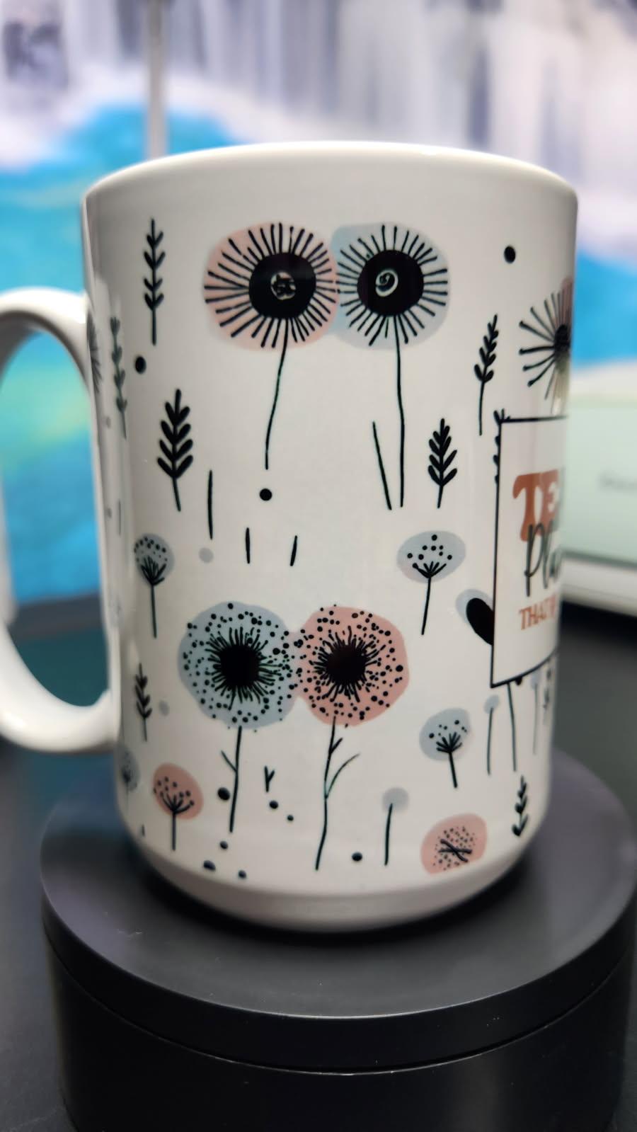 Mug with floral design on a black surface