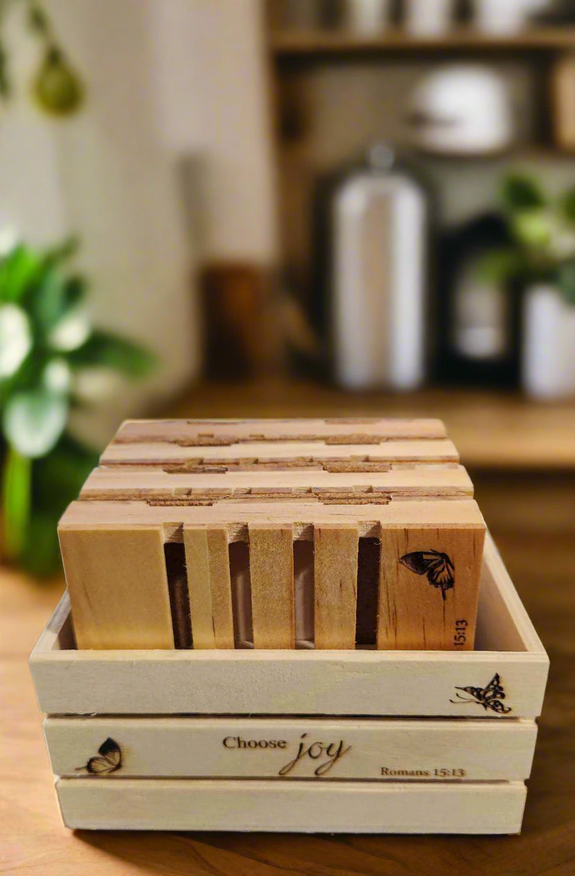 crate with the text 'choose joy' and butterflies etched in the front.