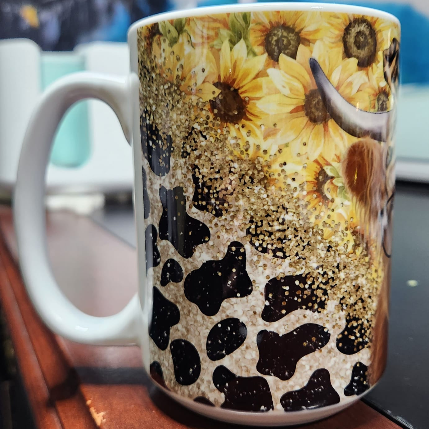 Highland cow with glasses and a bow and sunflowers in the back - one classy Heffer with glasses - sublimated 15oz mug -dishwasher and microwave safe.