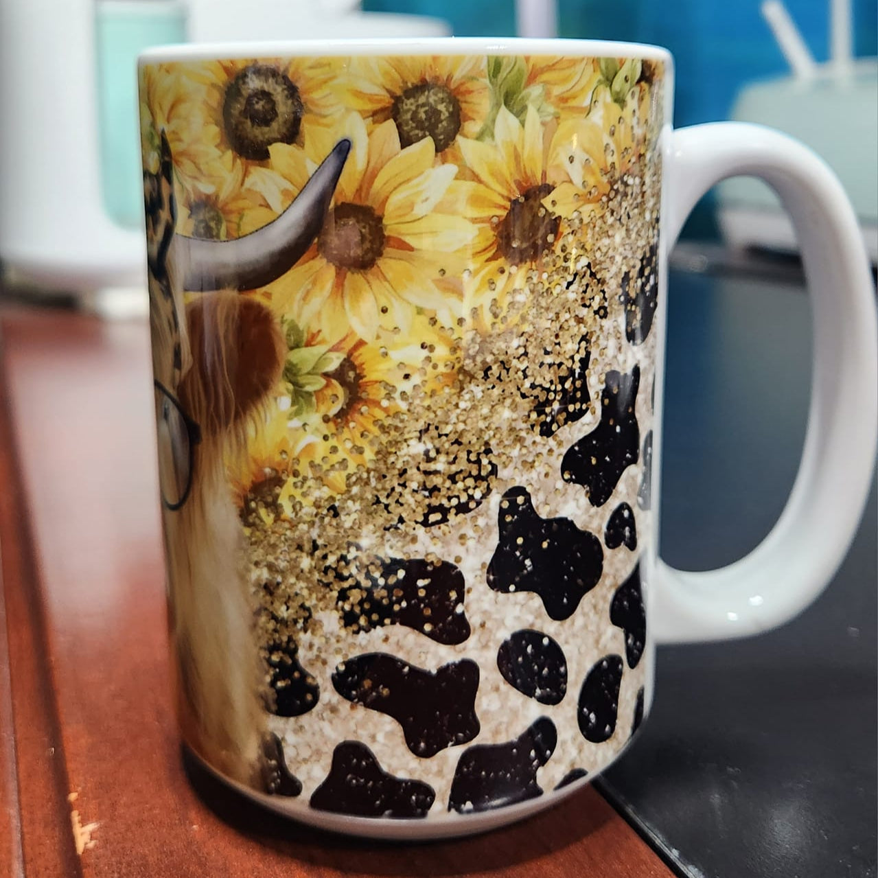 Highland cow with glasses and a bow and sunflowers in the back - one classy Heffer with glasses - sublimated 15oz mug -dishwasher and microwave safe.