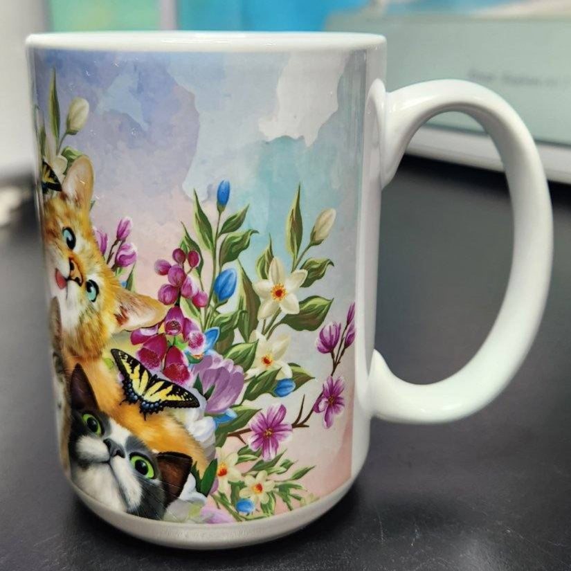 butterflies, flowers, cats with funny faces, and a blue sky