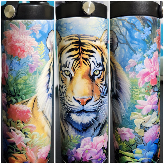 orange tiger with pink flowers in the jungle