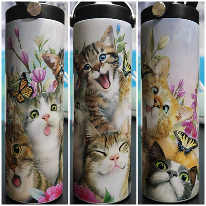 selfie cats 20oz tumbler with butterflies and the cats are making fun faces.