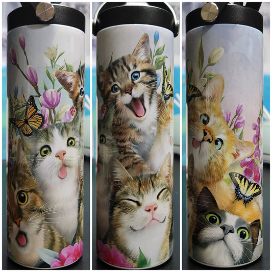 selfie cats 20oz tumbler with butterflies and the cats are making fun faces.