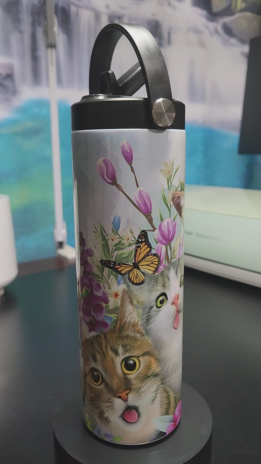 selfie cats 20oz tumbler with butterflies and the cats are making fun faces.