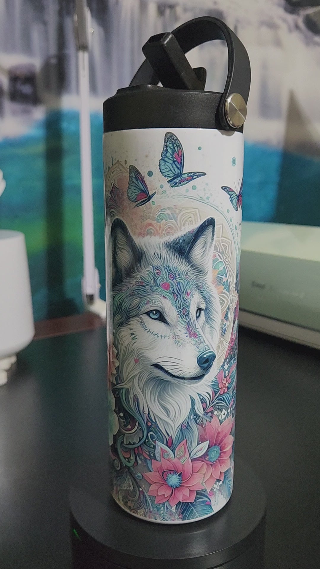 blue and pink butterflies and flowers surrounding a wolf